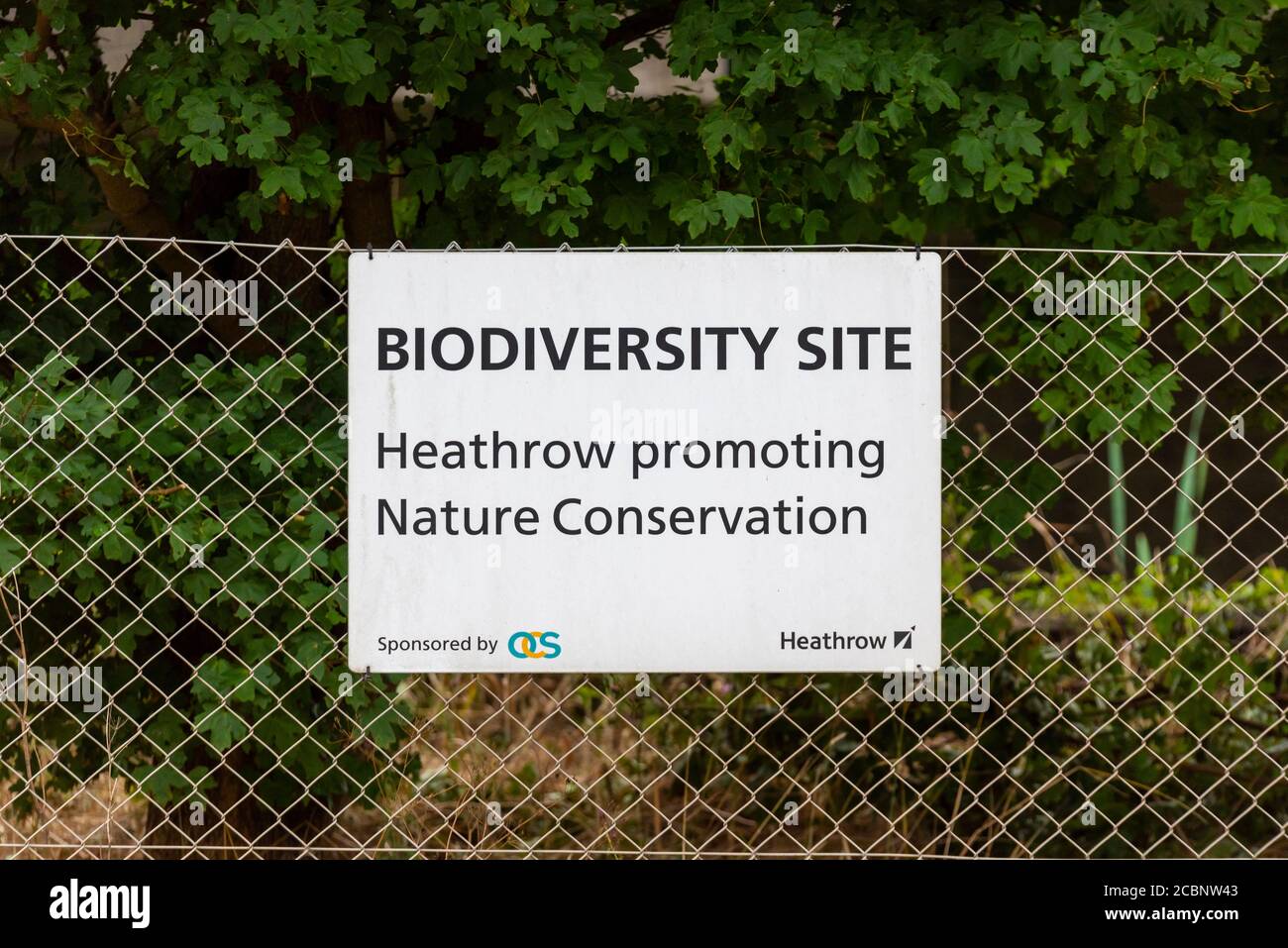 Biodiversity Site. Heathrow promoting nature conservation, sign. Areas surrounding the airport are protected and left natural. Landscaped by OCS Stock Photo