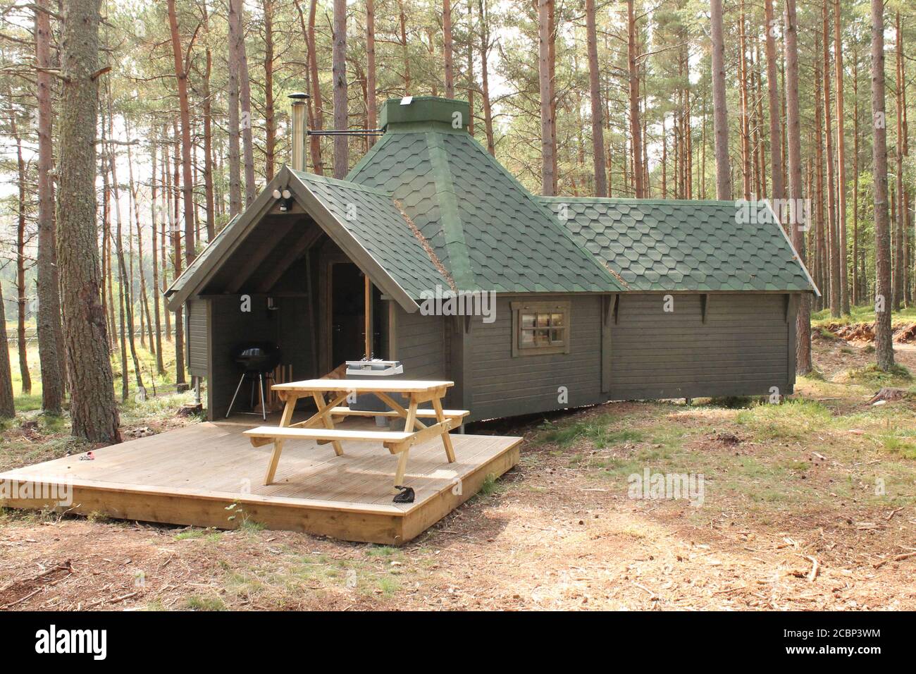 A remote cabin in the woods also known as a Bothy Stock Photo