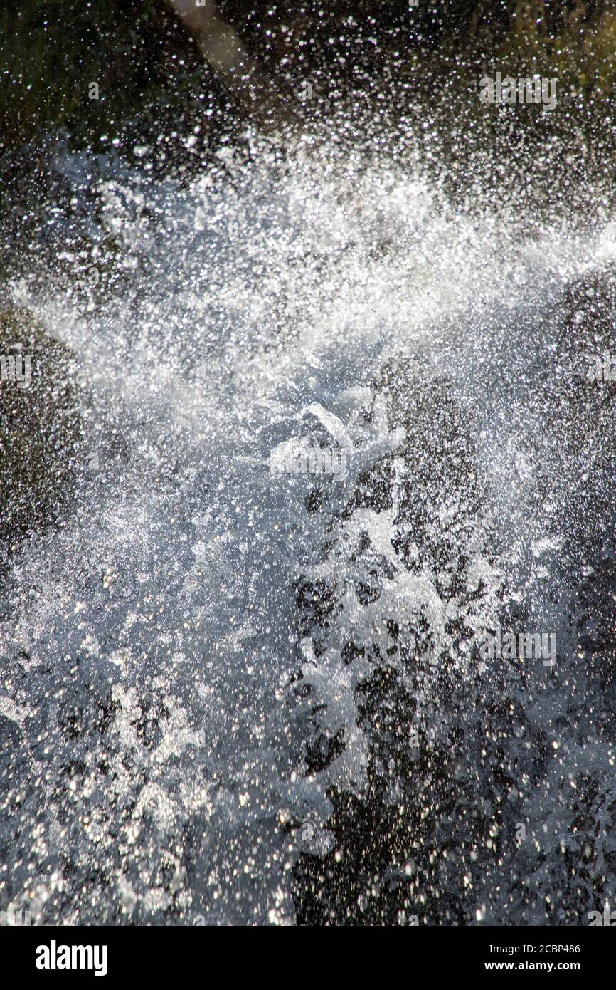 Water falling from the sky in drops like rain Stock Photo