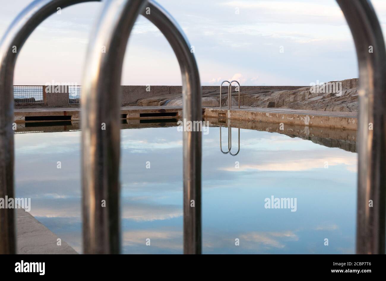 Refections at the Ocean Pool, Yamba, New South Wales, Australia Stock Photo