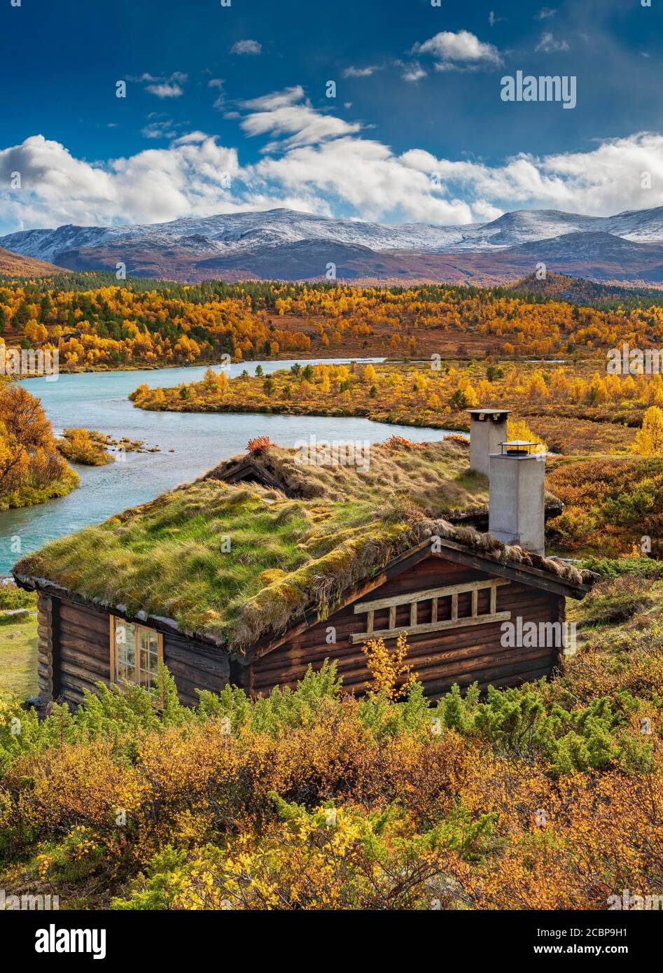 Wooden cabin, wide landscape, turquoise river, colorful vegetation and discolored trees in autumn, Ruska Aika, Indian Summer, Indian Summer, Indian Stock Photo