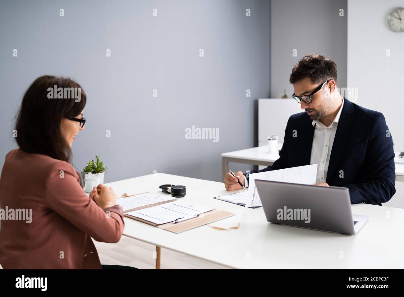 Job Interview. Business Manager Talking To Recruiter In Meeting Stock Photo