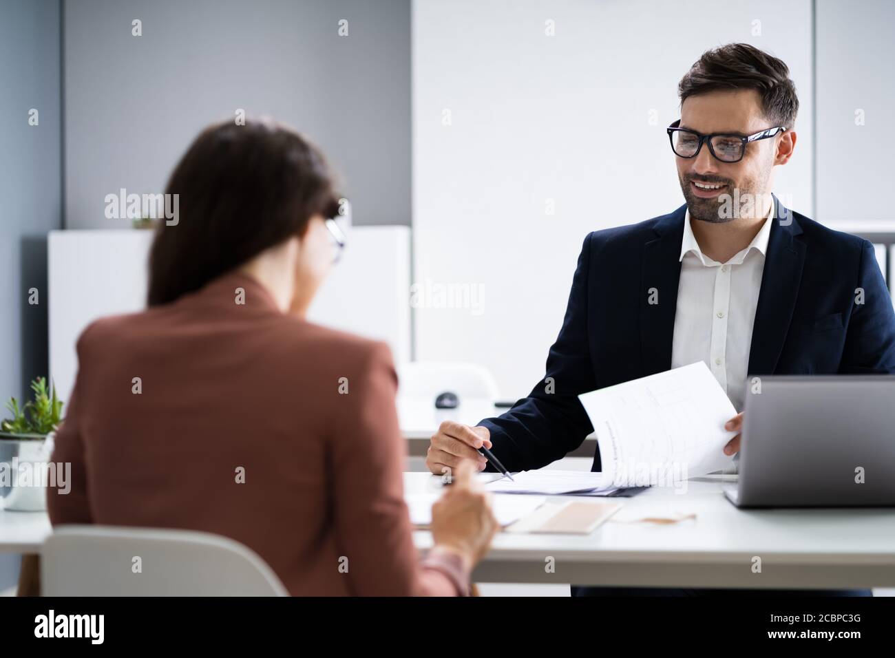 Job Interview. Business Manager Talking To Recruiter In Meeting Stock Photo