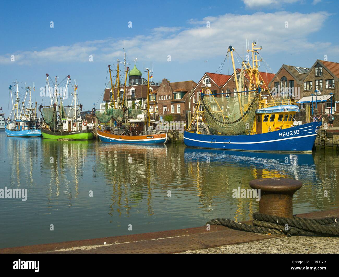 Fishing cutter, berth, east harbour, Neuharlingersiel, coastal town, cutter harbour, bathing resort, East Frisia, North Germany, Germany Stock Photo