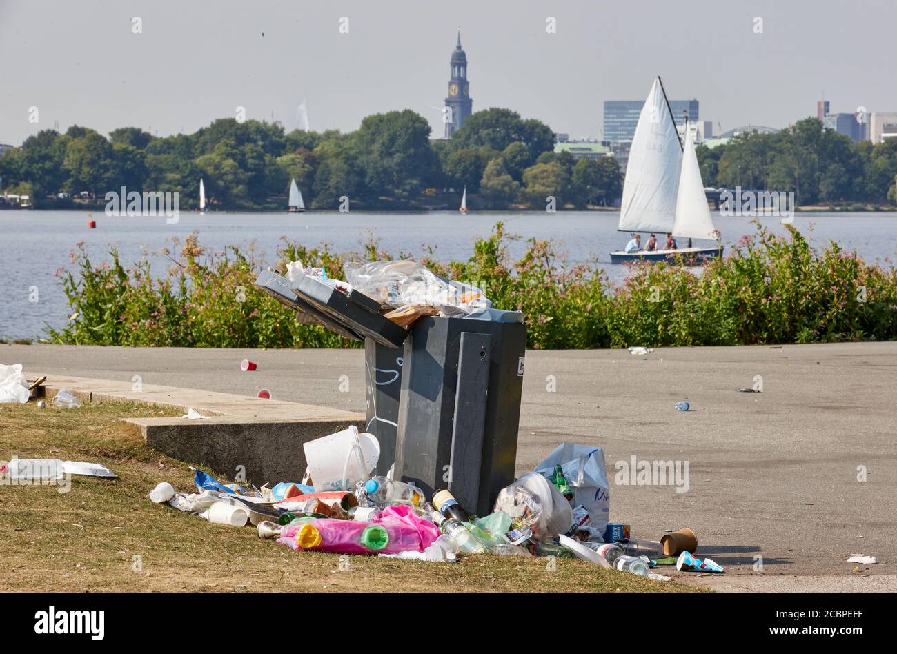 Hamburg, Germany. 14th Aug, 2020. Garbage lies on the edge of the
