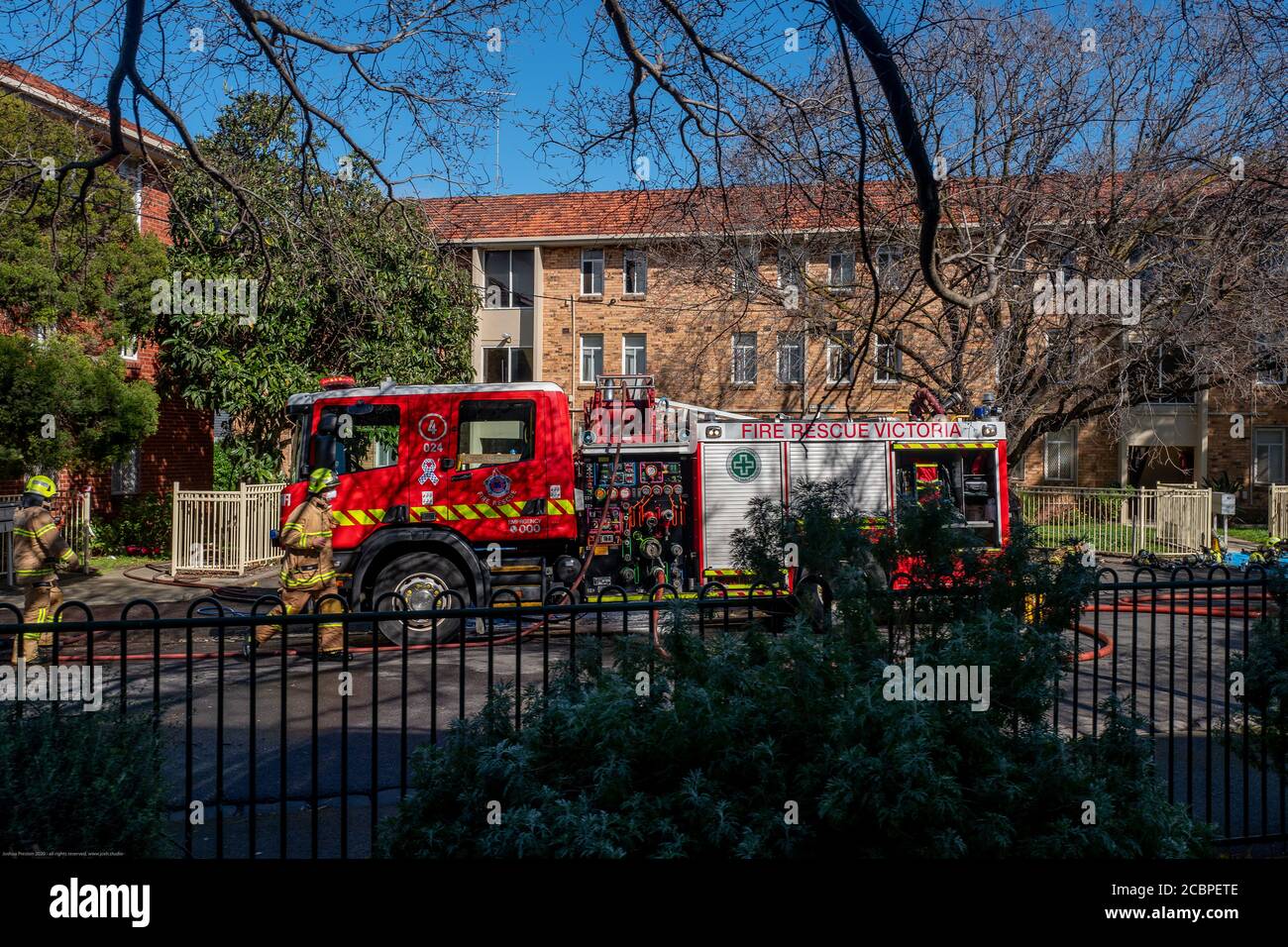 Fitzroy North, Melbourne, Australia. 15th Aug 2020. Over 10 emergency services vehicles in attendance as trapped young child rescued from fire in State Housing apartment block on Clauscen Street, Fitzroy North, Melbourne on Saturday. Clauscen Street and Nicholson Street remain closed whilst investigations take place. Credit: Joshua Preston/Alamy Live News Stock Photo