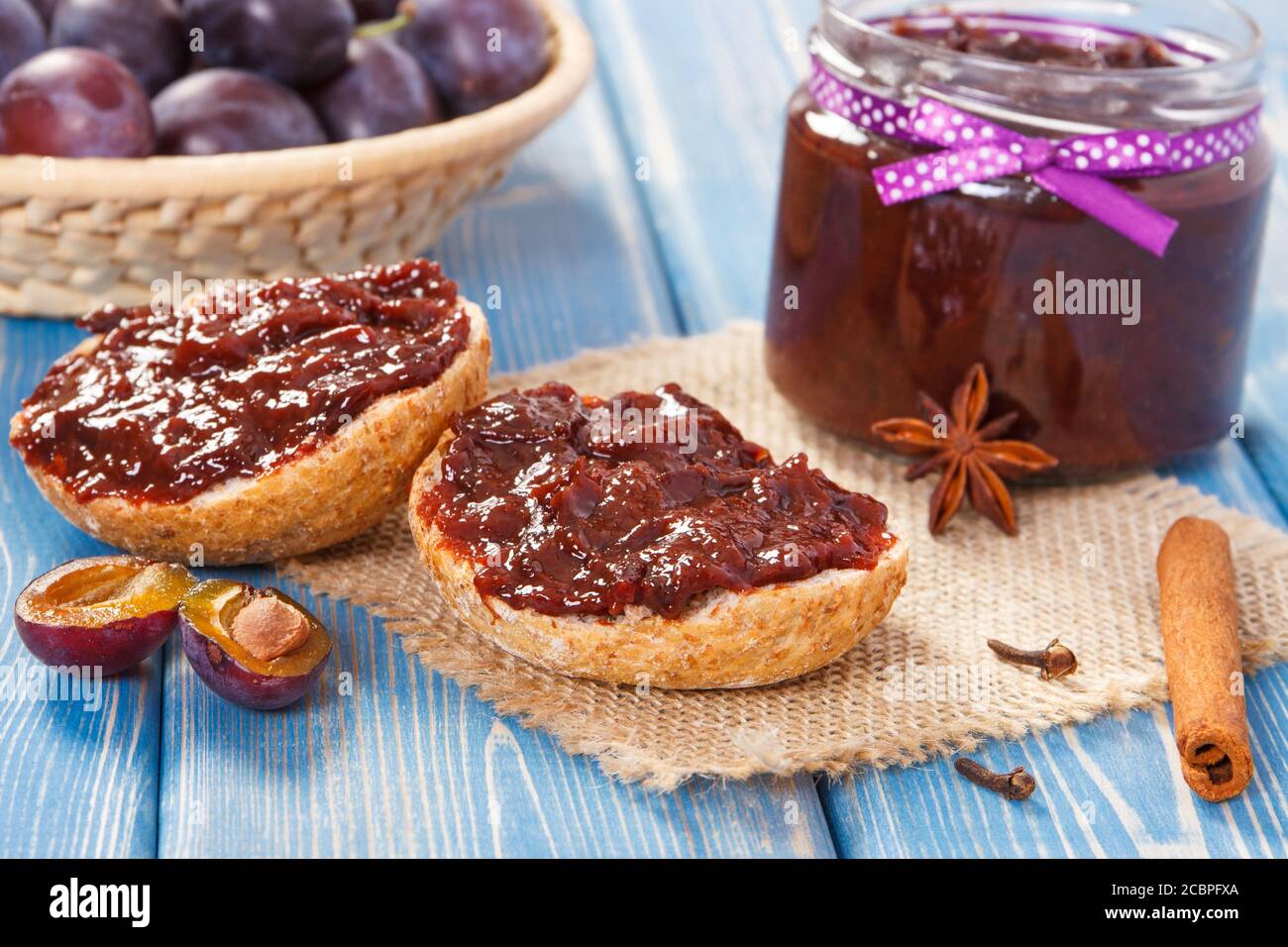 Sandwiches with plum marmalade or jam, concept of healthy sweet snack or dessert Stock Photo