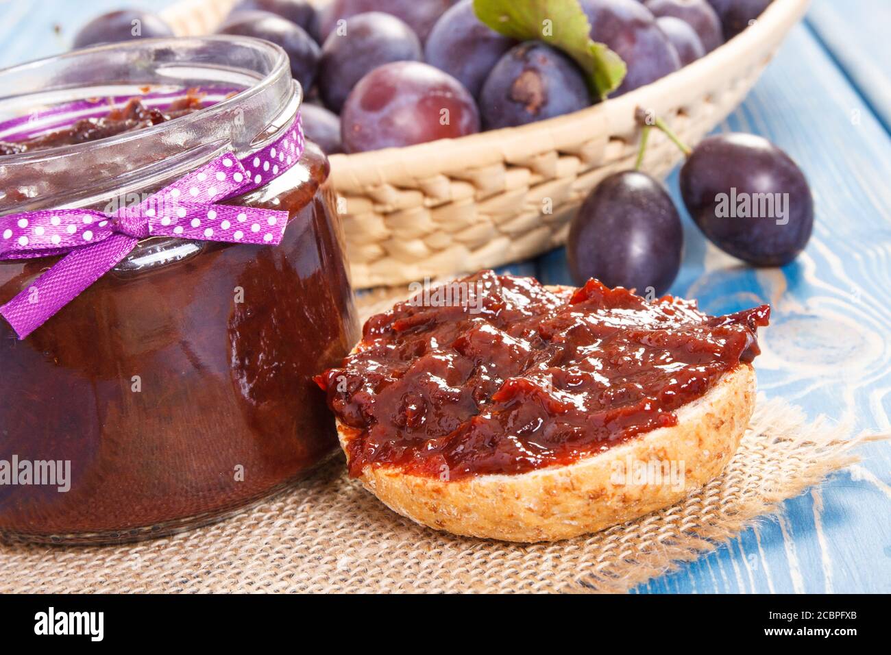 Sandwiches with homemade plum marmalade or jam, concept of healthy sweet snack, breakfast or dessert Stock Photo