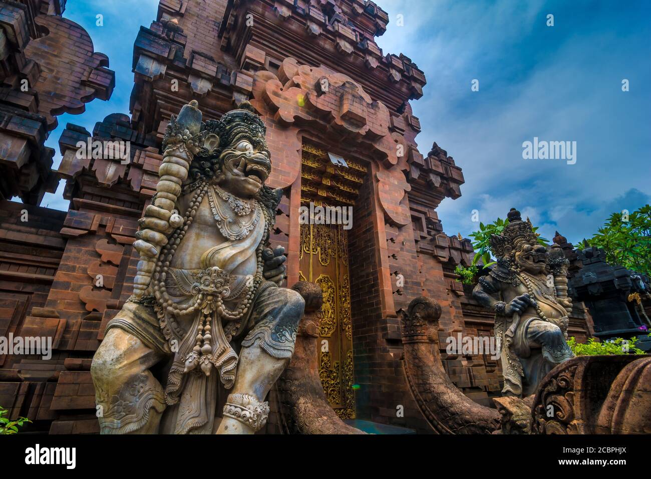 Statues at the entrance of a hinduist temple in Bali, Indonesia Stock ...