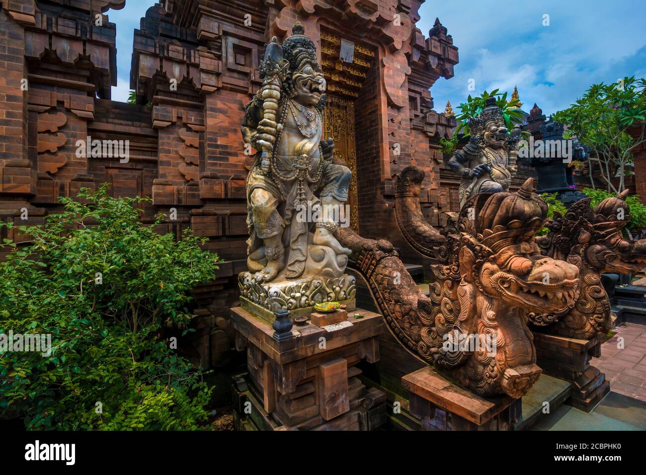 Statues at the entrance of a hinduist temple in Bali, Indonesia Stock ...