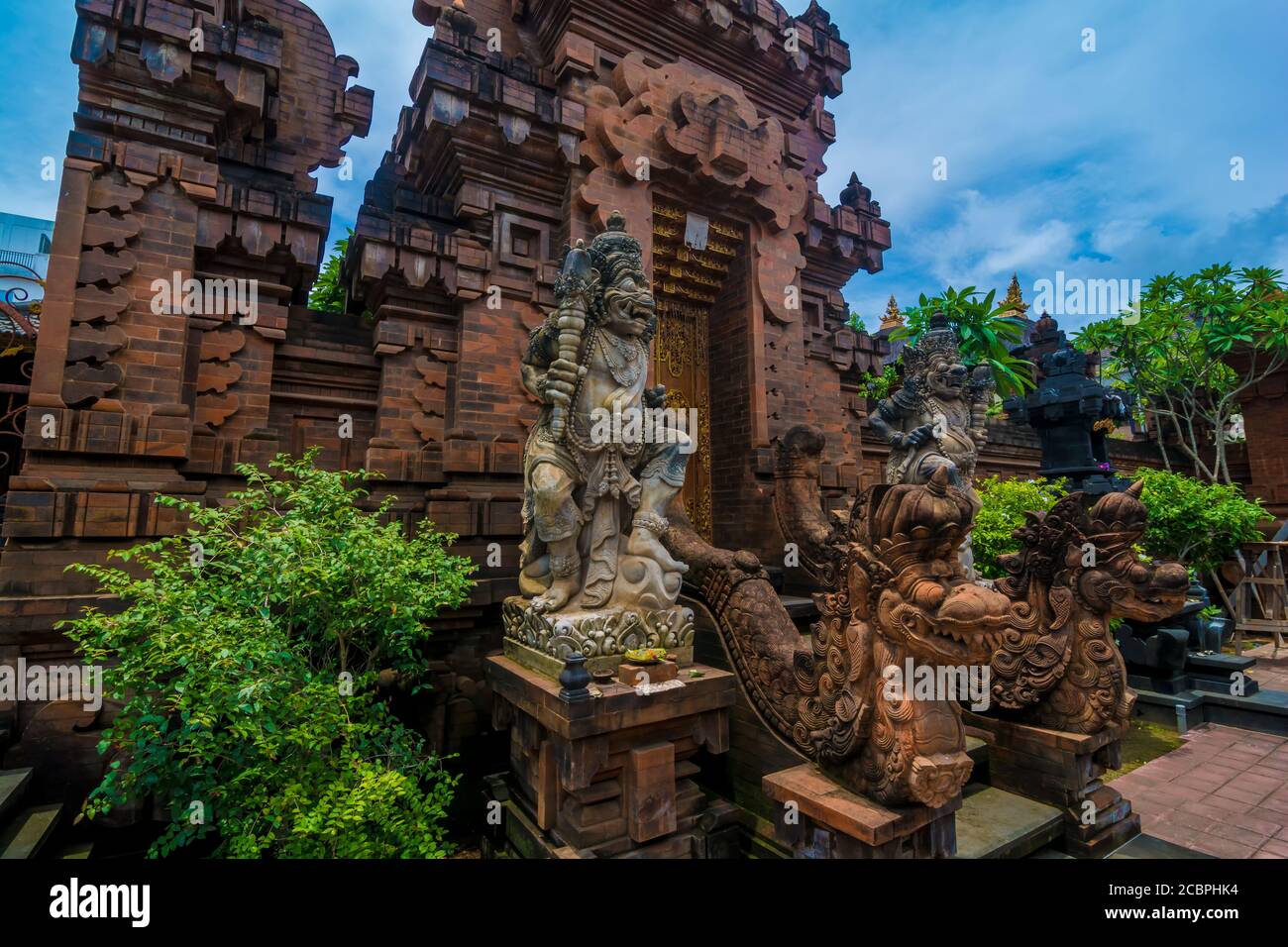 Statues at the entrance of a hinduist temple in Bali, Indonesia Stock ...