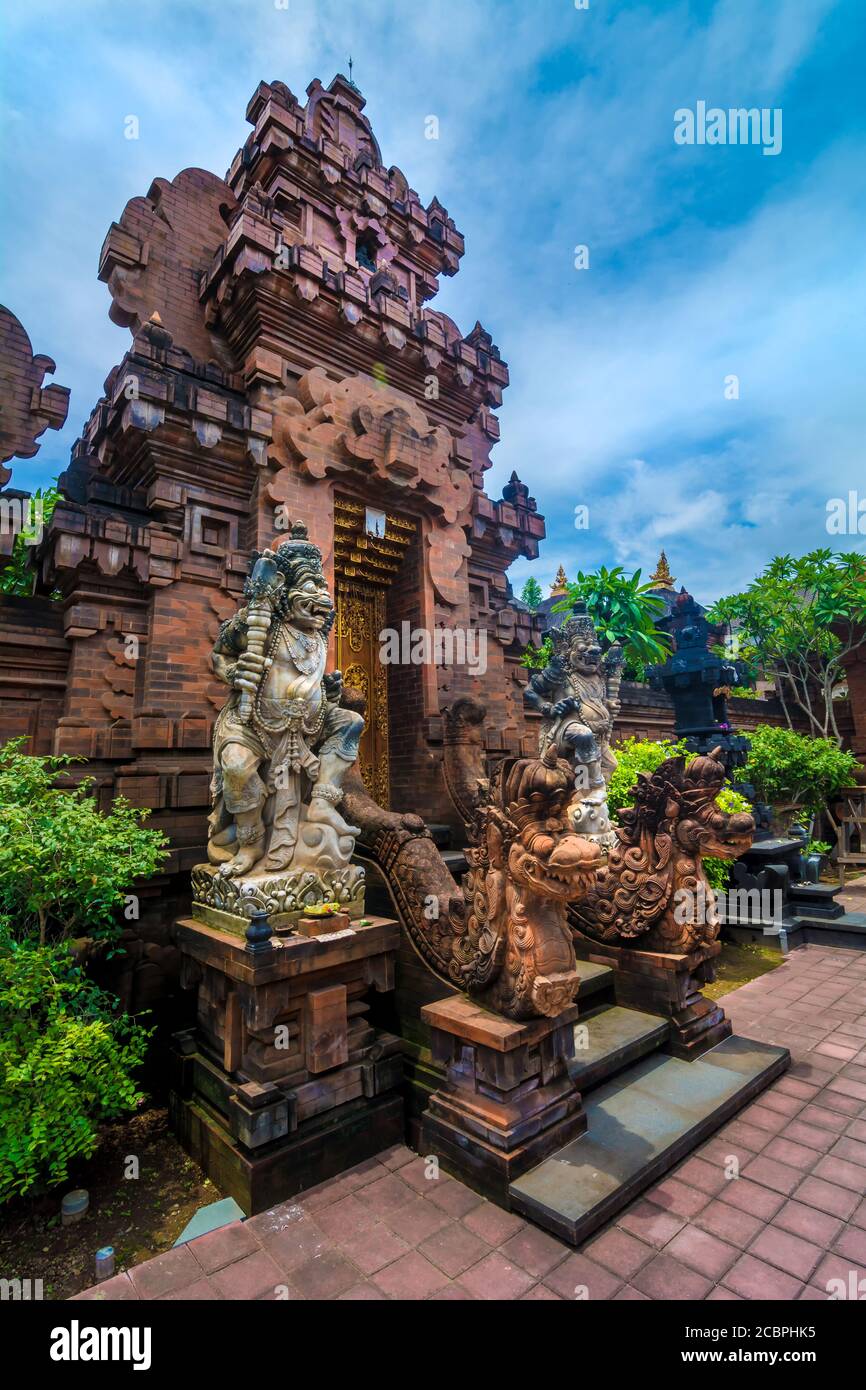 Statues at the entrance of a hinduist temple in Bali, Indonesia Stock ...