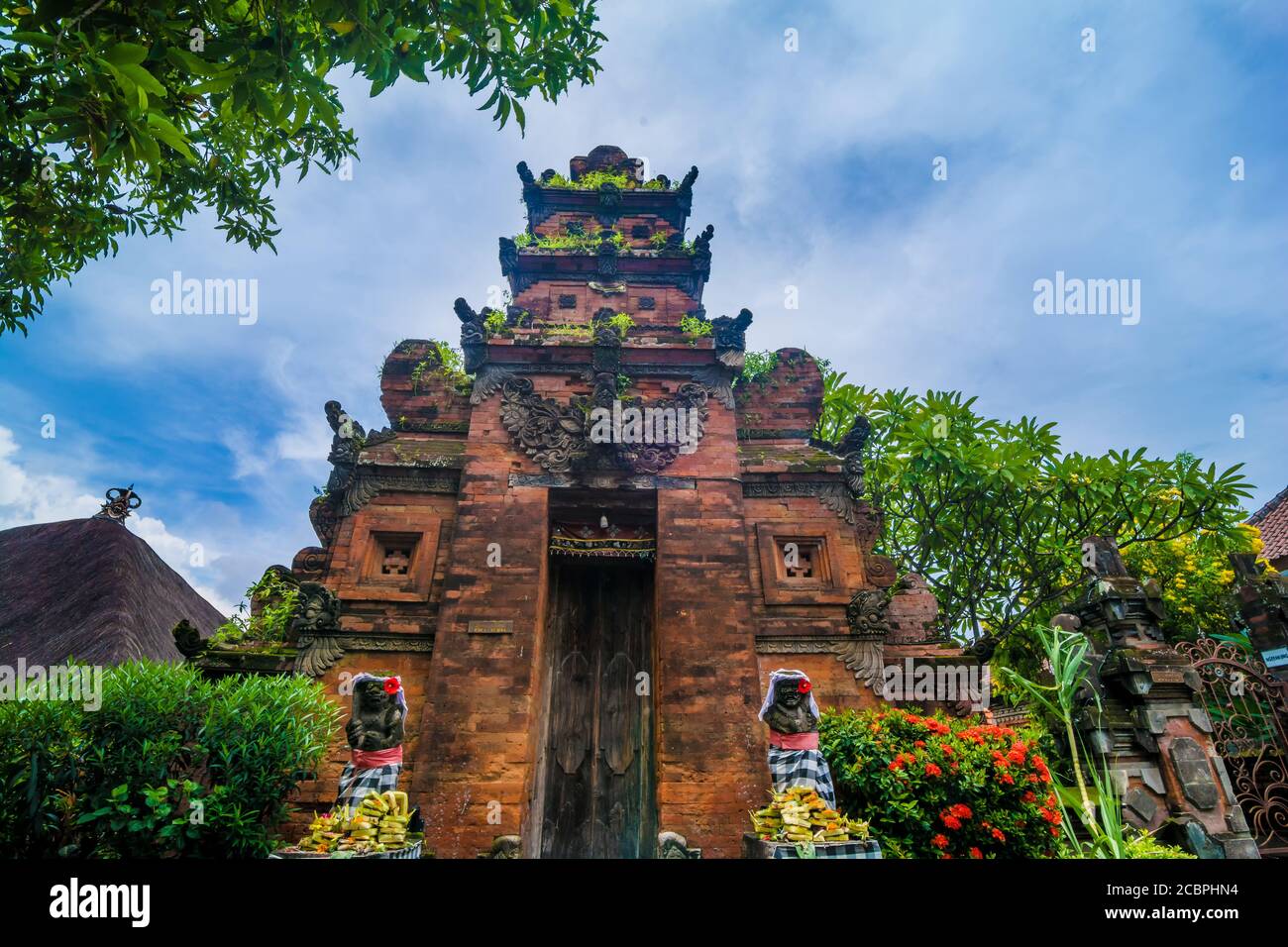Statues at the entrance of a hinduist temple in Bali, Indonesia Stock ...