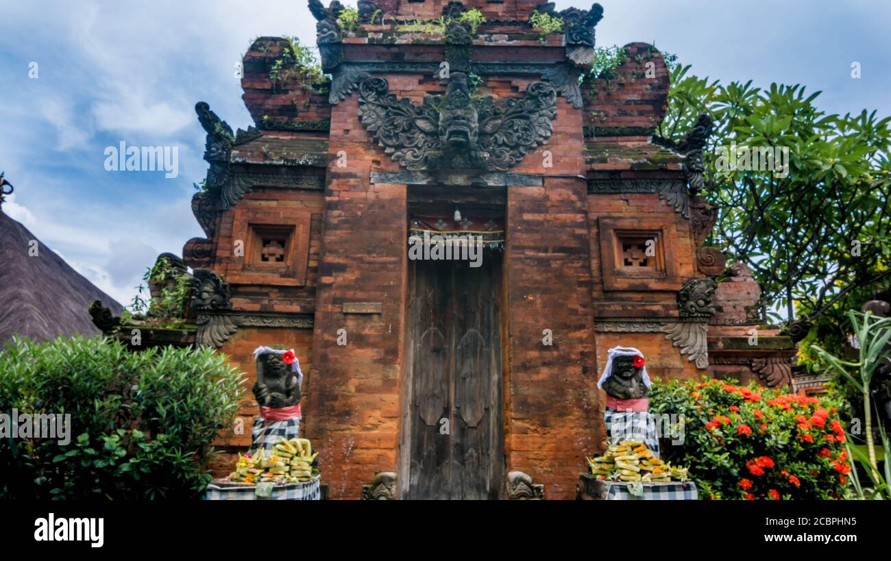 Statues at the entrance of a hinduist temple in Bali, Indonesia Stock ...