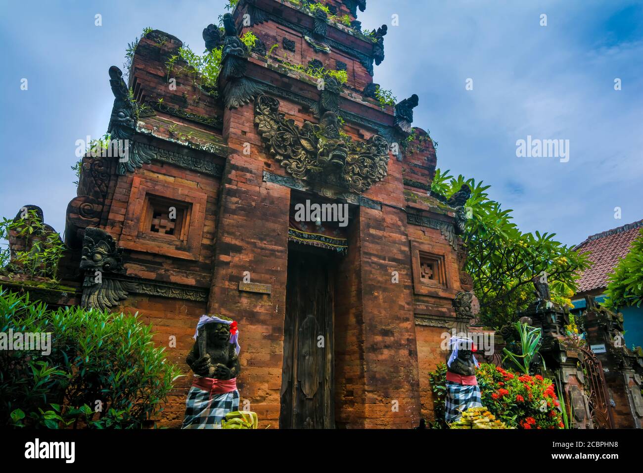 Statues at the entrance of a hinduist temple in Bali, Indonesia Stock ...