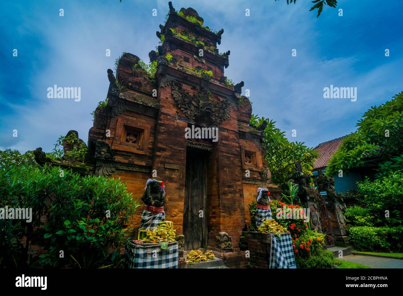 Statues at the entrance of a hinduist temple in Bali, Indonesia Stock ...