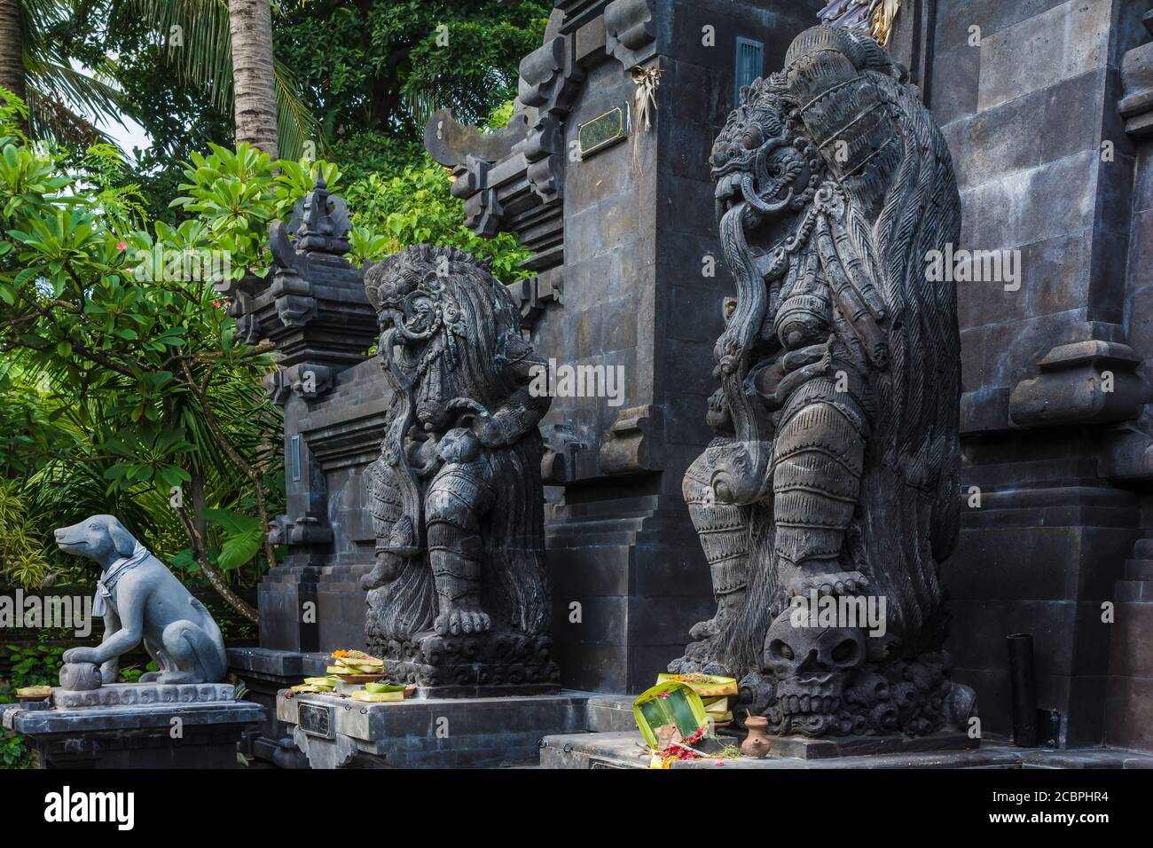 Statues at the entrance of a hinduist temple in Bali, Indonesia Stock ...