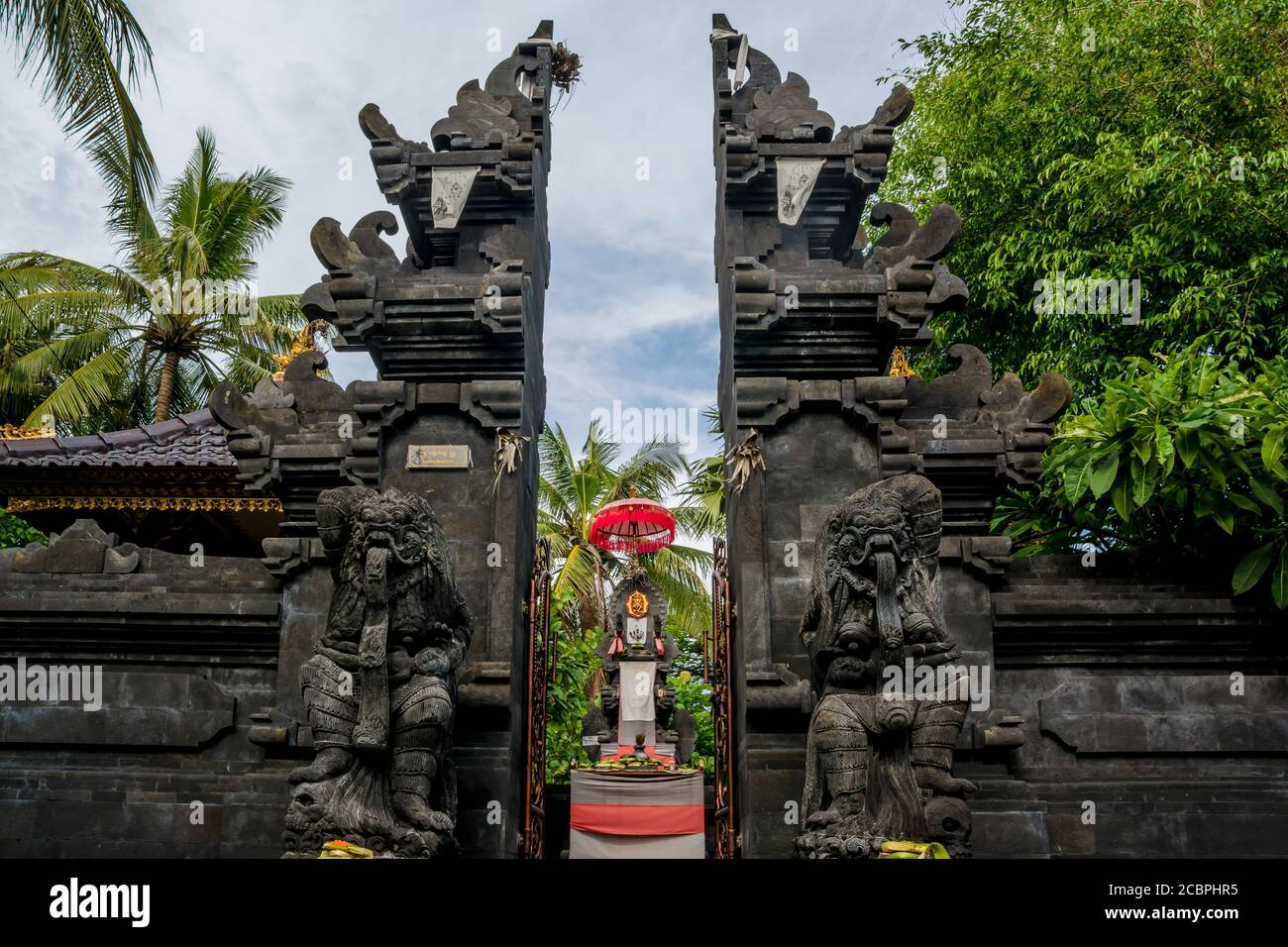 Statues at the entrance of a hinduist temple in Bali, Indonesia Stock ...