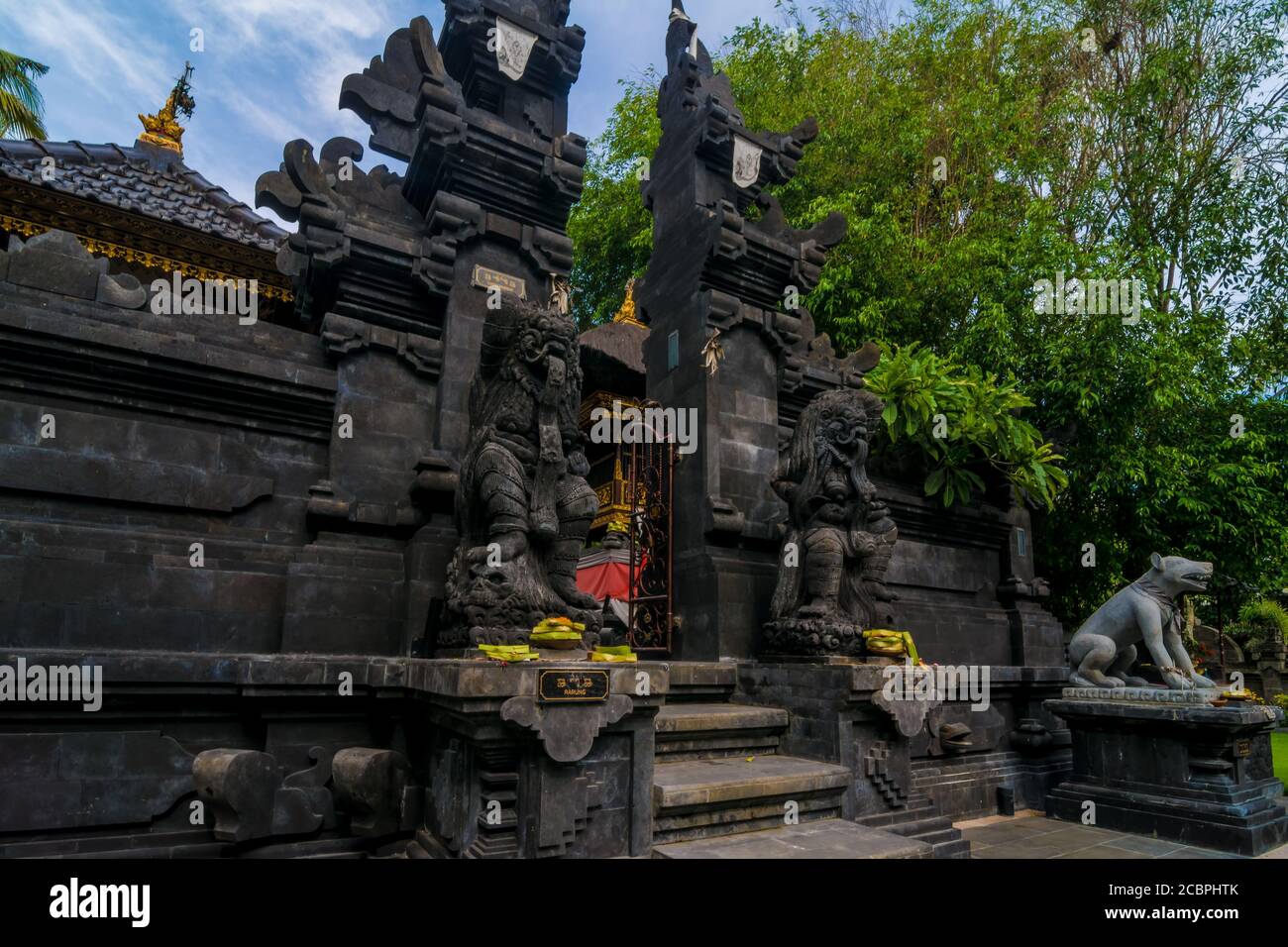 Statues at the entrance of a hinduist temple in Bali, Indonesia Stock ...