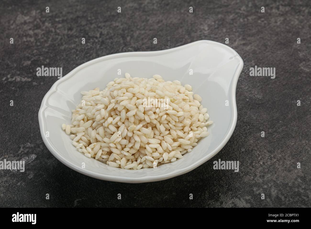 Raw Italian arborio rice for Risotto Stock Photo Alamy