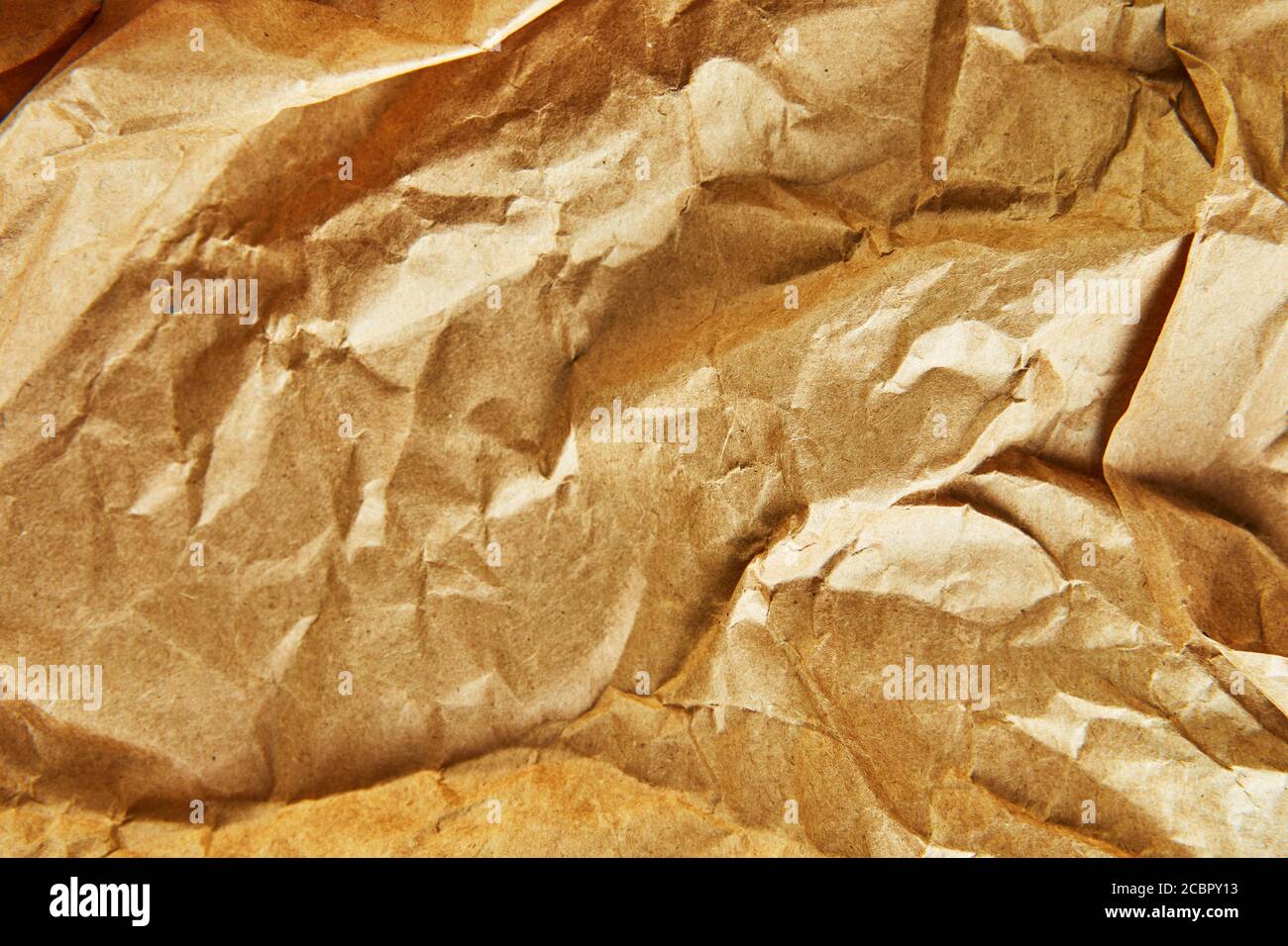 Background texture wrapping paper crumpled in different places. Stock Photo