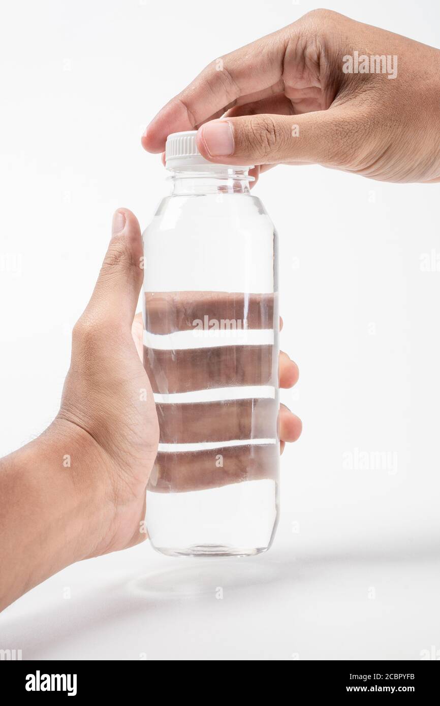hand holding liquid product on blank plastic container bottle mockup ...