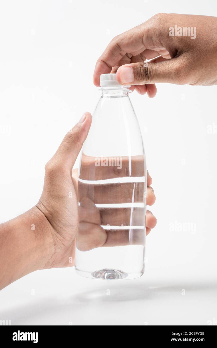 hand holding liquid product on blank plastic container bottle mockup ...