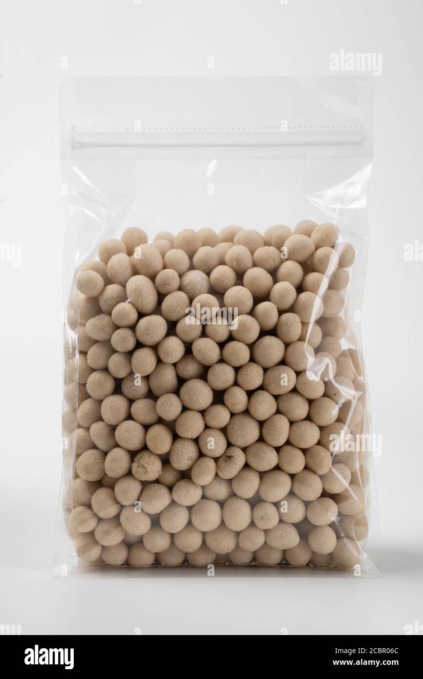 peanut product on blank plastic container Stock Photo