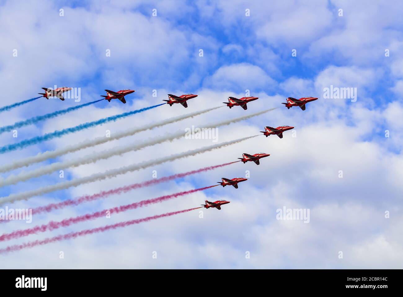 Red Arrows, Royal Air Force Acrobatic Team, in flight over Duxford Stock Photo