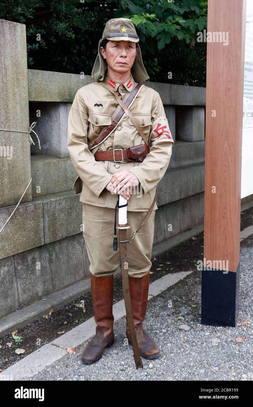 Tokyo, Japan. 15th Aug, 2020. A man dressed as a Japanese imperial army ...