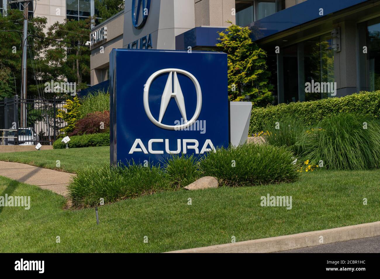 Acura company logo seen on one of their car dealerships showrooms Stock