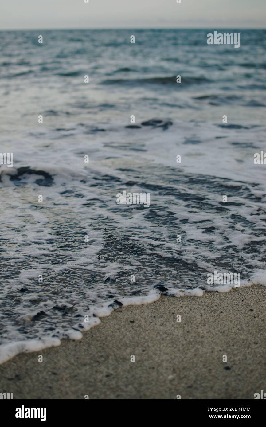 Vertical shot foamy sea hi-res stock photography and images - Alamy