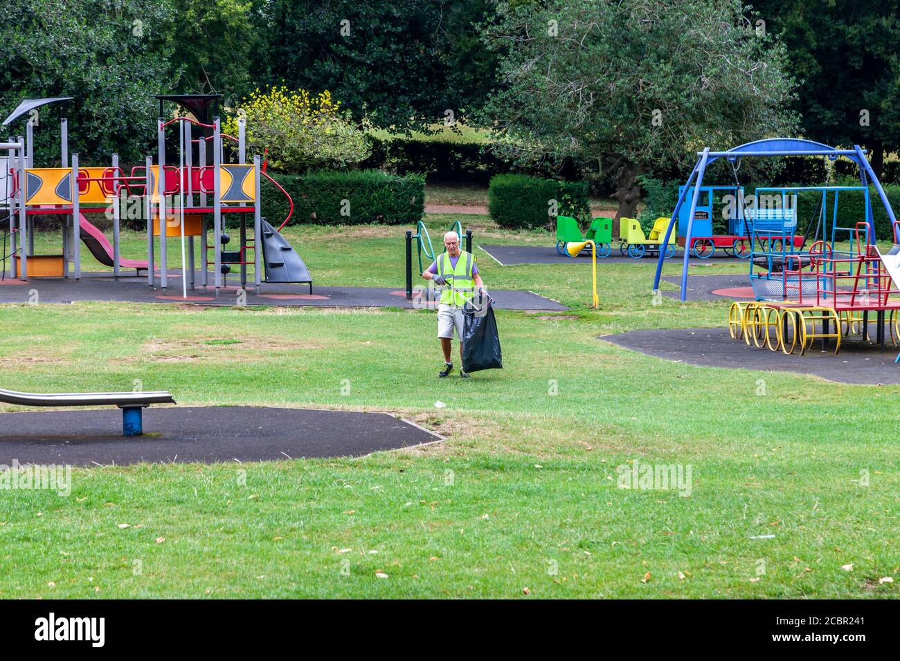Northampton, UK, 15th August 2020. A local male resident litter picking