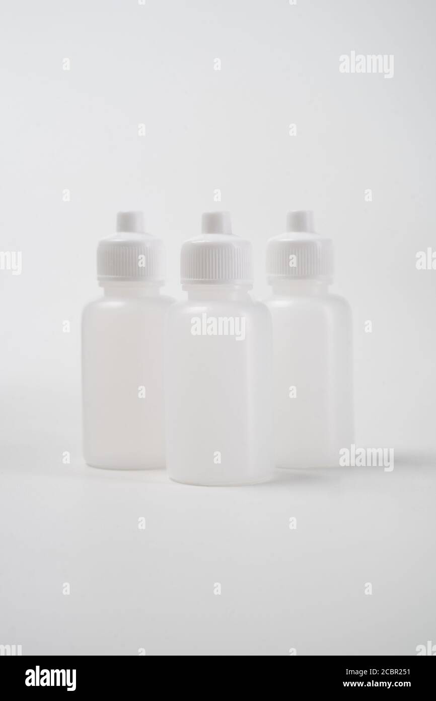 cosmetic plastic bottles, isolated on white background Stock Photo - Alamy