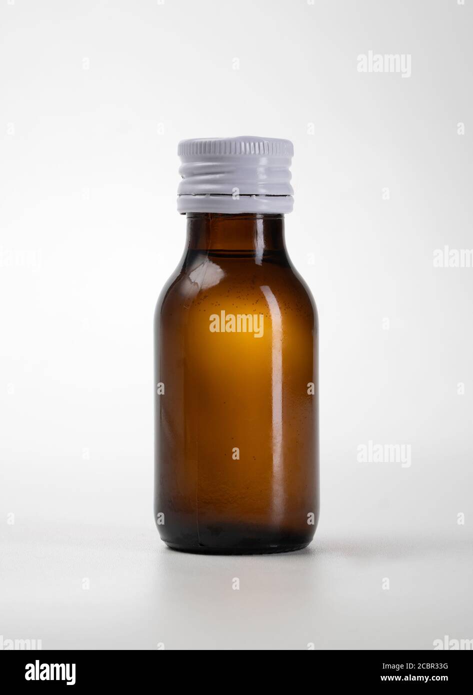 Blank Glass Medical Bottle mockup Isolated on White Background Stock