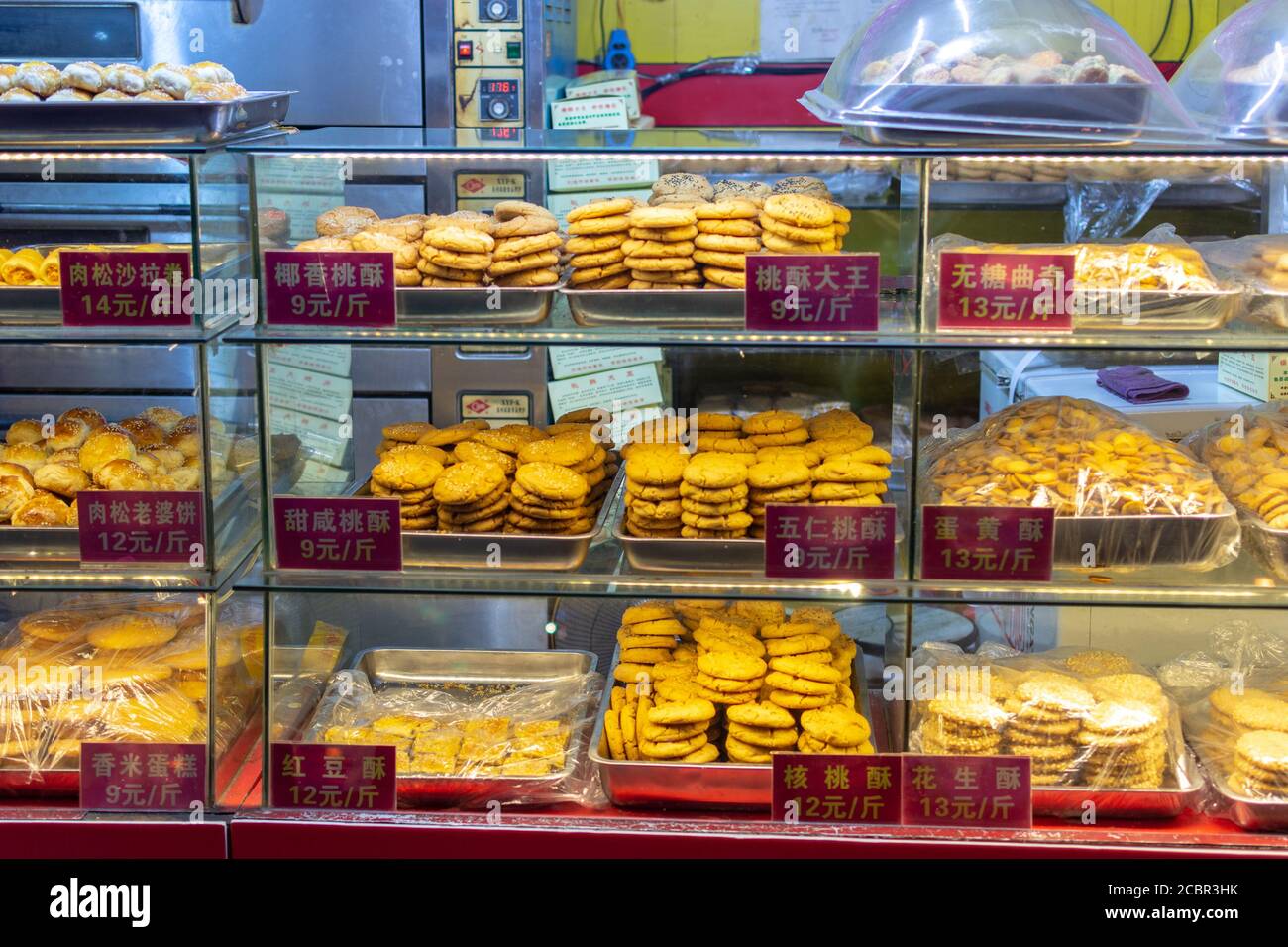 Luoyang, Henan Province / China - January 3, 2016: Traditional pastry and cookies on a street market food stall in Luoyang Old City Stock Photo