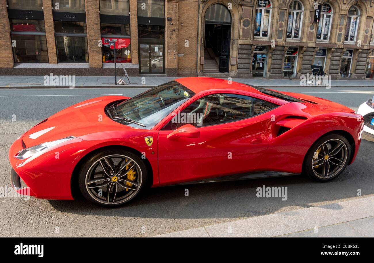 A red Ferrari parked on Victoria Street in Liverpool Stock Photo