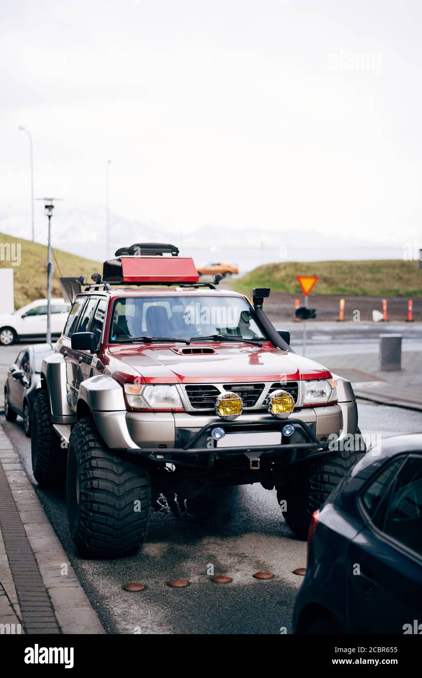 Reykjavik, Iceland - 02 may 2019: A huge red Nissan Patrol GR SUV with  large wheels parked on a street in Reykjavik, Iceland Stock Photo - Alamy