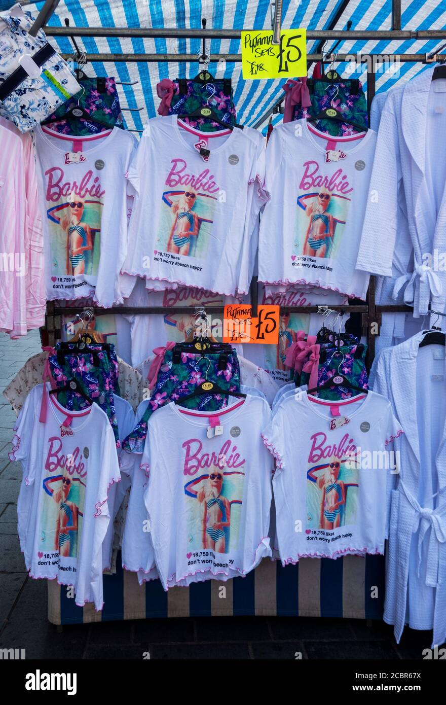 Barbie tee shirts on sale for 5 pounds at a Liverpool Street stand Stock Photo