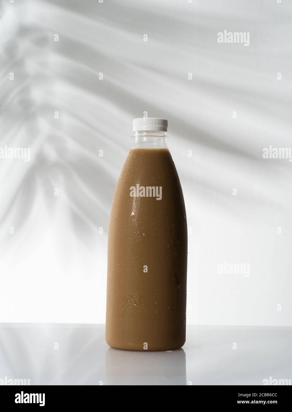 coffee product mockup on plastic bottle over white background Stock