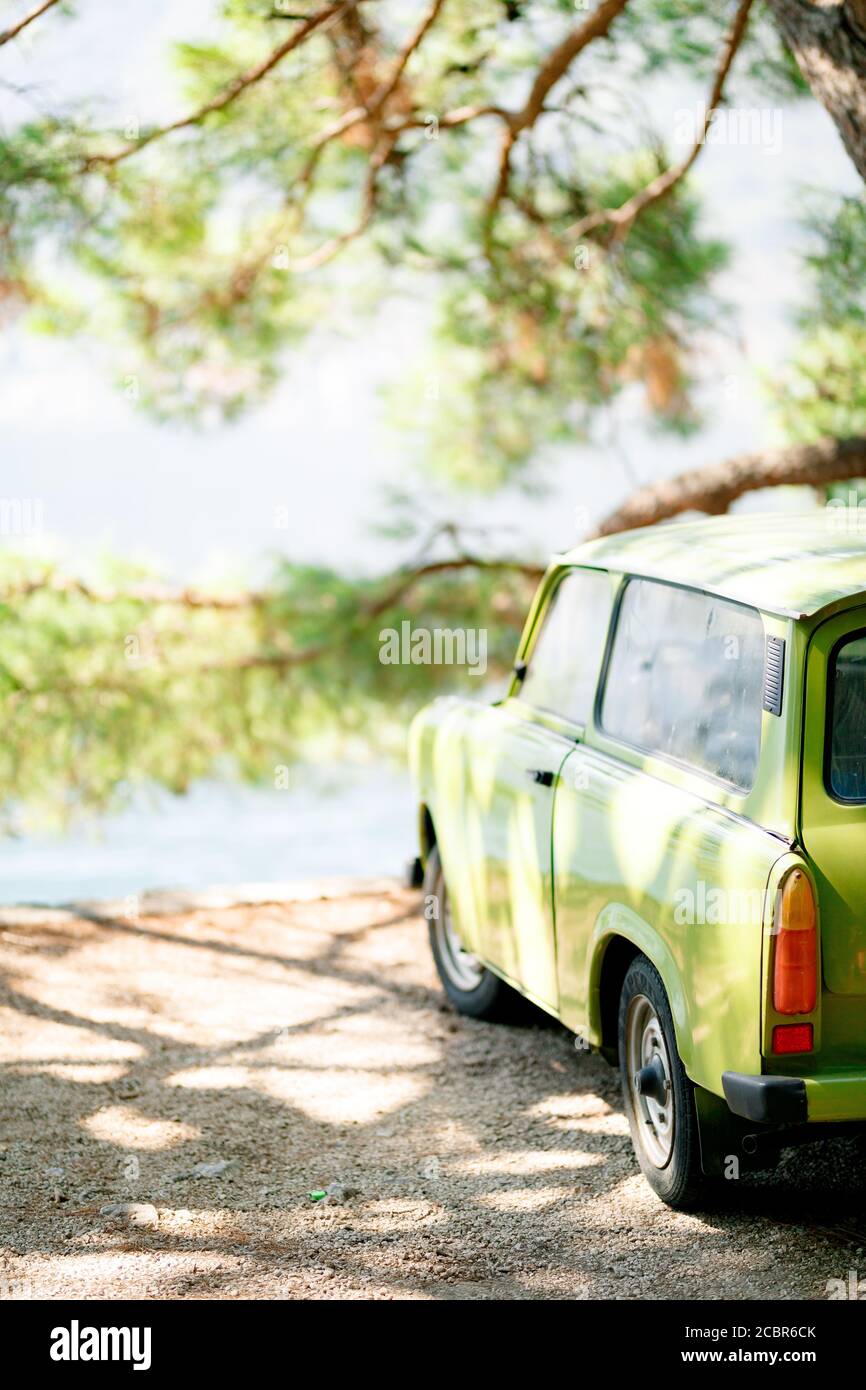 Perast, Montenegro - 07 august 2020: Old car Zastava, light green, produced in Yugoslavia, a non-existent country. Stock Photo