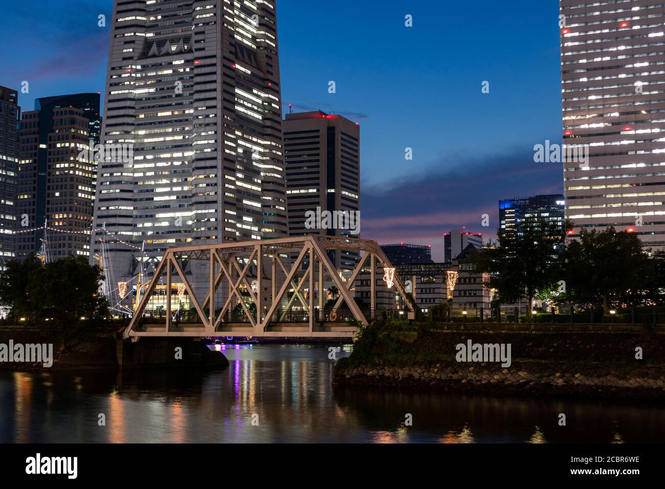 Small pedestrian bridge connecting artificial island in Japan Stock