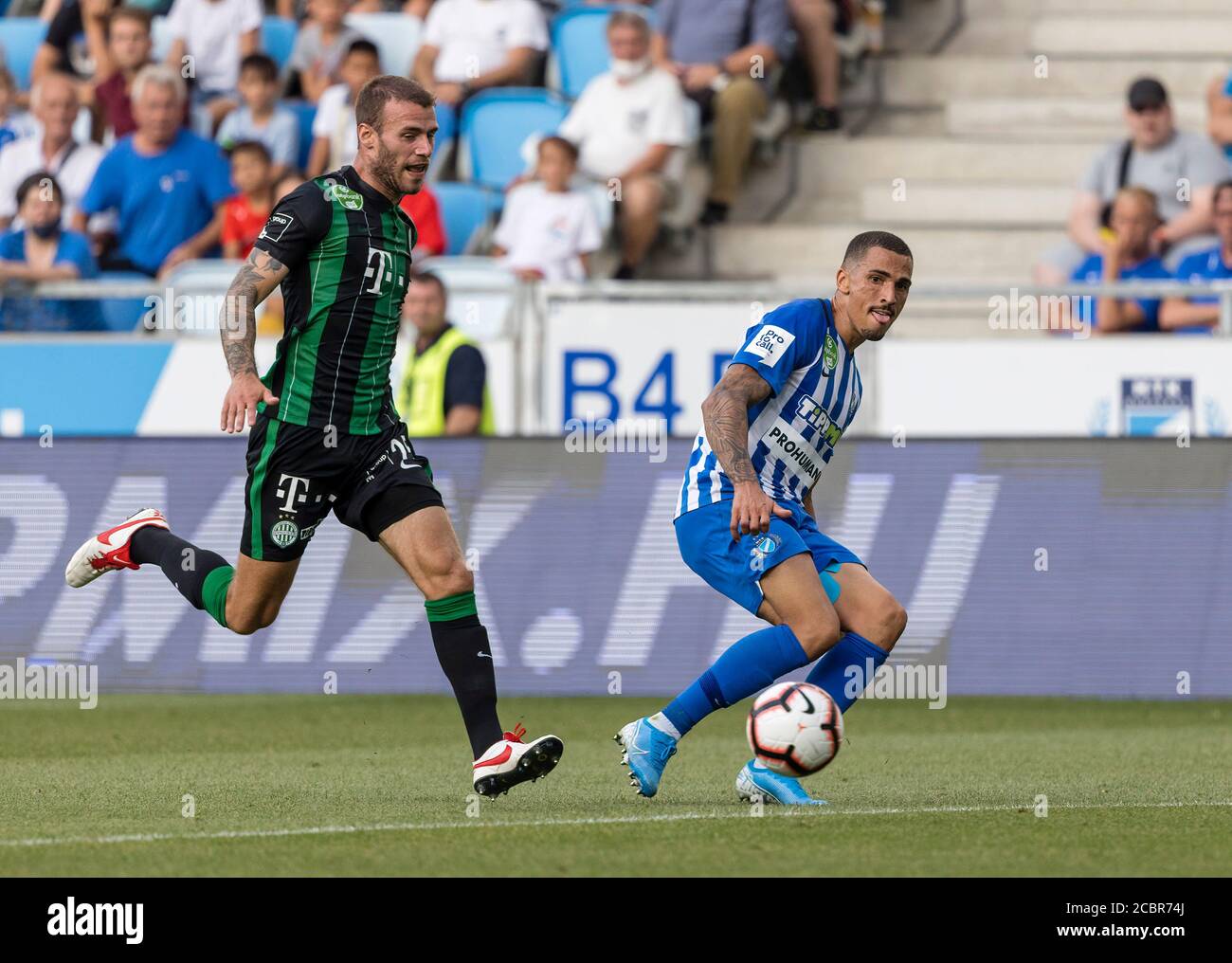 BUDAPEST, HUNGARY - MAY 11: Franck Boli of Ferencvarosi TC celebrates after  scoring a goal with Miha Blazic of Ferencvarosi TC during the Hungarian Cup  Final match between Ferencvarosi TC and Paksi