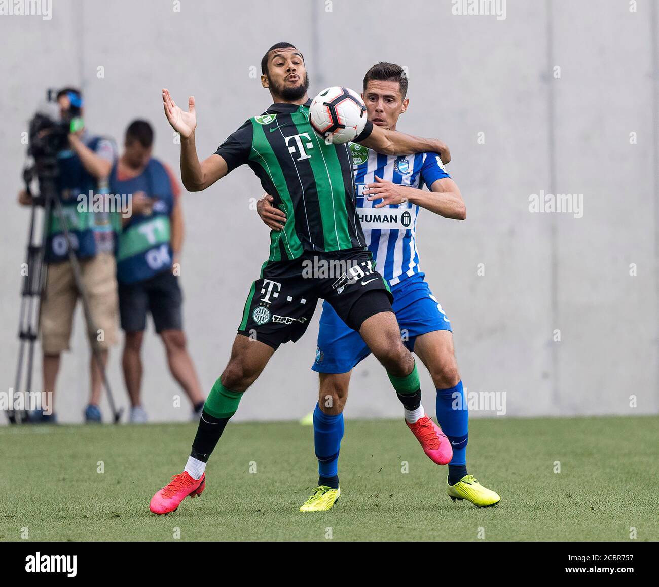 BUDAPEST, HUNGARY - MARCH 6: Lazar Zlicic of Kisvarda Master Good  challenges Aissa Laidouni of Ferencvarosi TC during the Hungarian OTP Bank  Liga match between Ferencvarosi TC and Kisvarda Master Good at