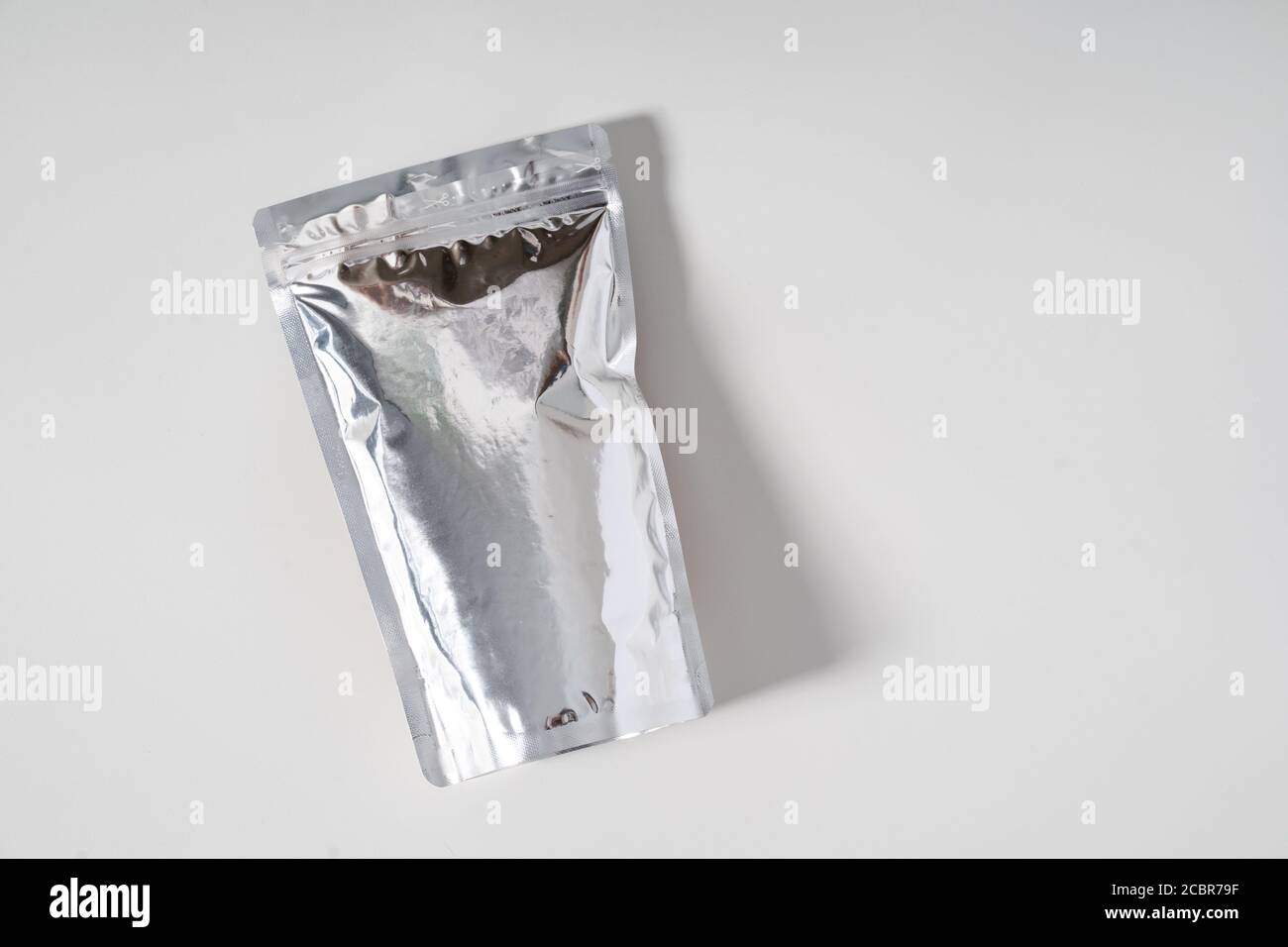 silver blank product mockup standing pouch Stock Photo