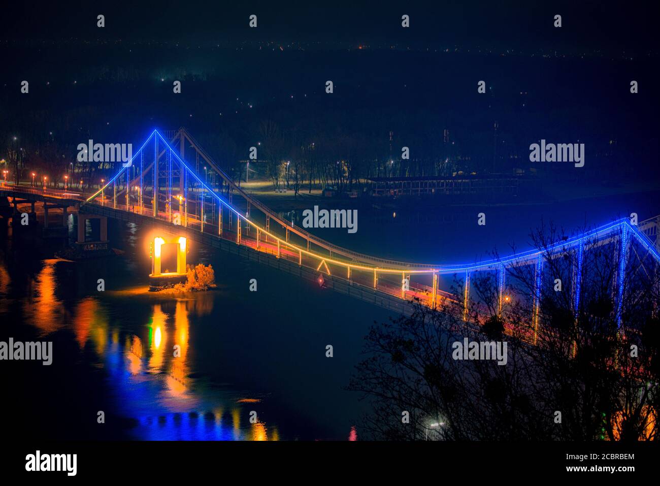 Night view of the pedestrian bridge, Kyiv, the capital of Ukraine Stock Photo