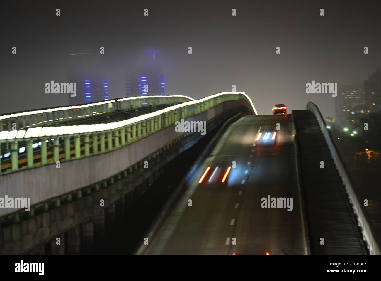 Night view of the Metro Bridge, in Kyiv, the capital of Ukraine Stock Photo