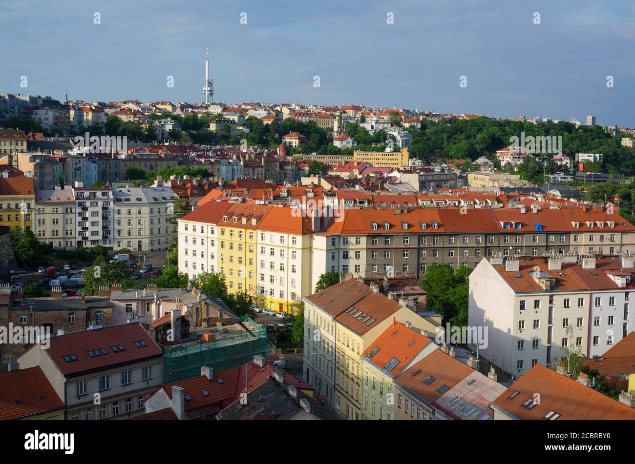Vinohrady district, Zizkov television communications tower and transmitter in the background, Prague, Czech Republic / Czechia - aerial view of street Stock Photo