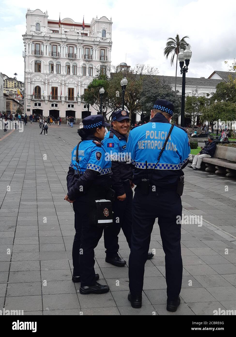 Ecuadorian local police patrolling at city centre streets. Quito / Ecuador. Stock Photo