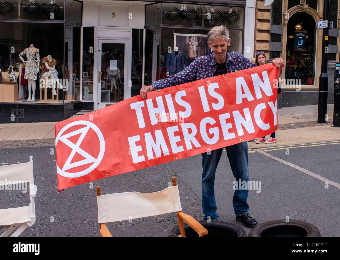 Harrogate, North Yorkshire, UK. 15th Aug, 2020. Members of Extinction Rebellion reclaim public areas in the centre of the town by occupying parking spaces. Credit: ernesto rogata/Alamy Live News Stock Photo